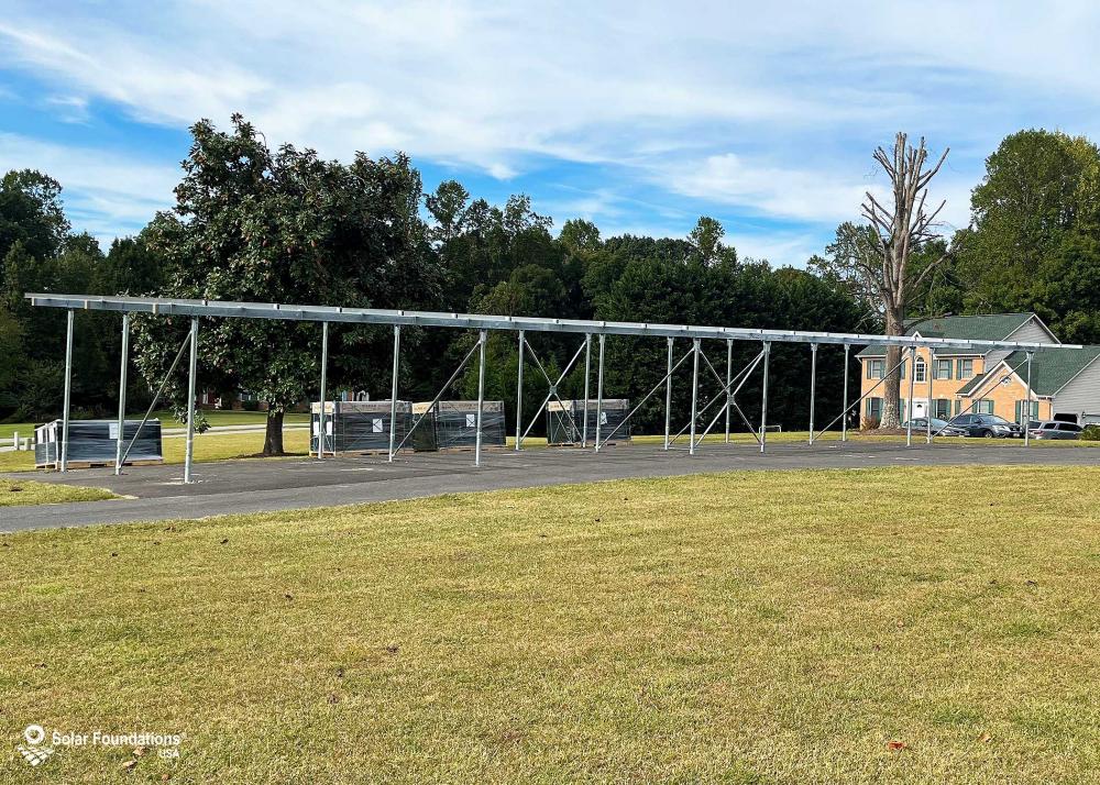 35.52 kW Utility Carport System in Hughesville, MD. This featured system is built for 8 panels high in landscape by 12 panel columns wide.
