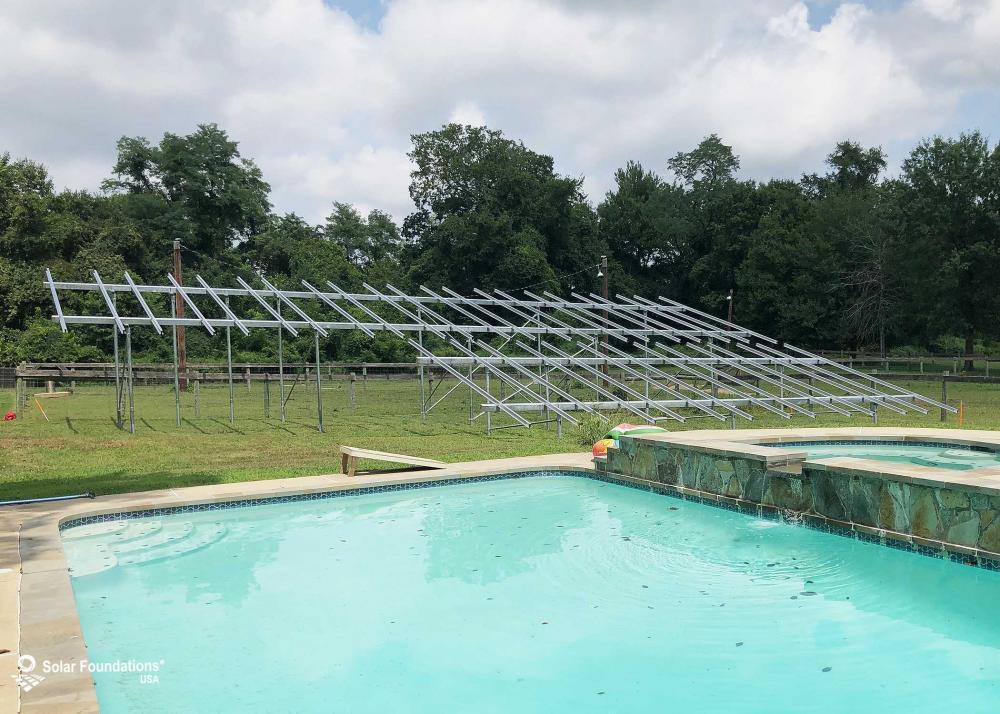 35.64 kW Ground Mount System in Bowie, MD. This featured system is built for (1) 6 panels high in landscape by 7 panel columns wide, and (1) 6 panels high in landscape by 11 panel columns wide.