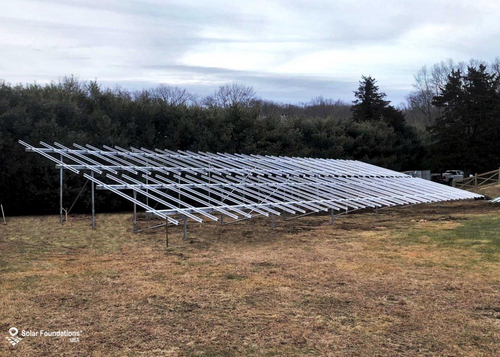 68.4 kW Ground Mount System in Weston, CT. This featured system is built for (2) 5 panels high in landscape by 19 panel columns wide.