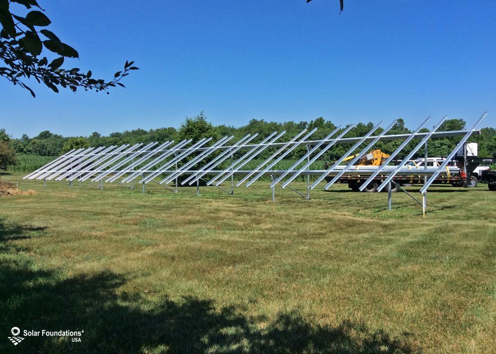 25.2 kW Ground Mount System in Mount Holly Springs, PA. This featured system is built for 4 panels high in landscape by 18 panel columns wide.