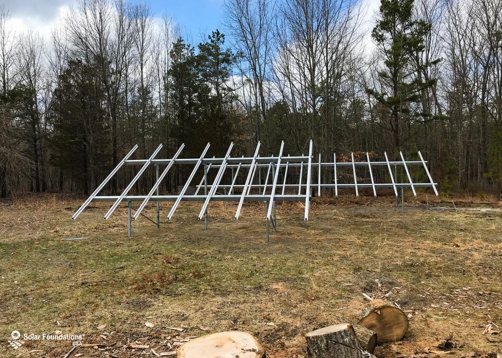 14.52 kW Ground Mount System in Egg Harbor City, NJ. This featured system is built for (1) 4 panels high in landscape by 7 panel columns wide and (1) 4 panels high in landscape by 4 panel columns wide.