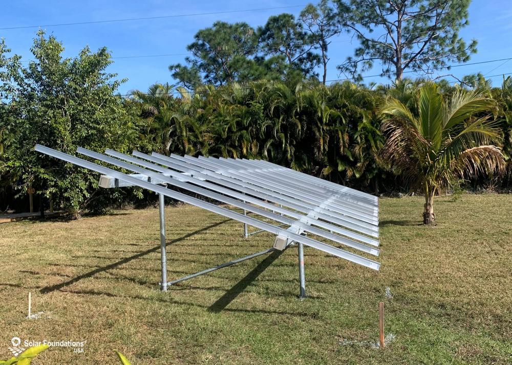 11.2 kW Ground Mount System in Port St Lucie, FL. This featured system is built for 4 panels high in landscape by 8 panel columns wide.
